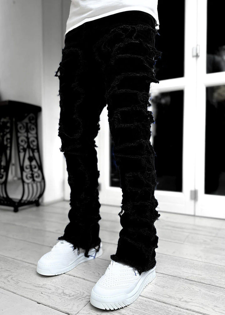 Stacked Ripped Jeans in Black — design detail