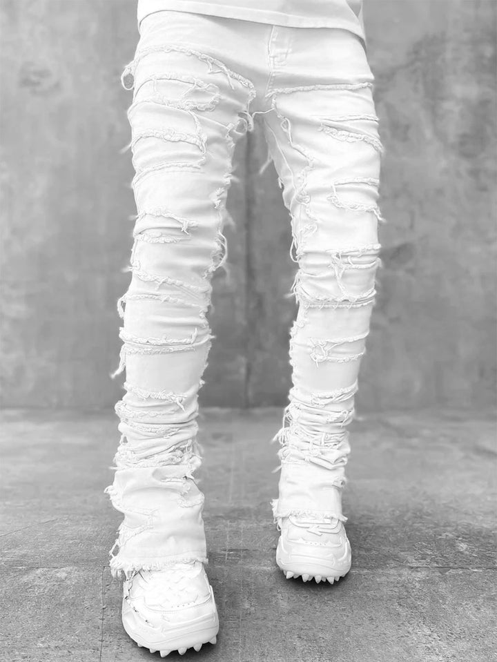 Stacked Ripped Jeans in White — design detail